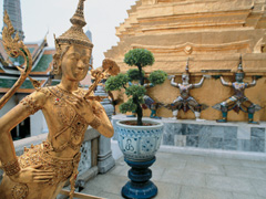 Golden statues adorning a Bangkok temple